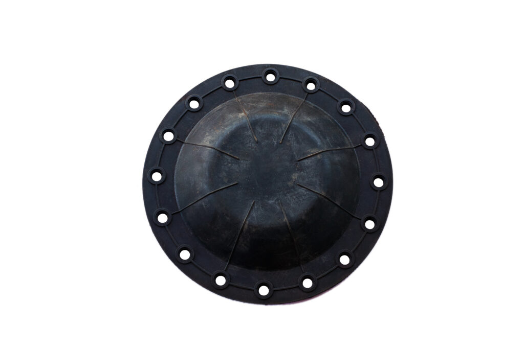 Truck brake chamber membrane on an isolated white background.